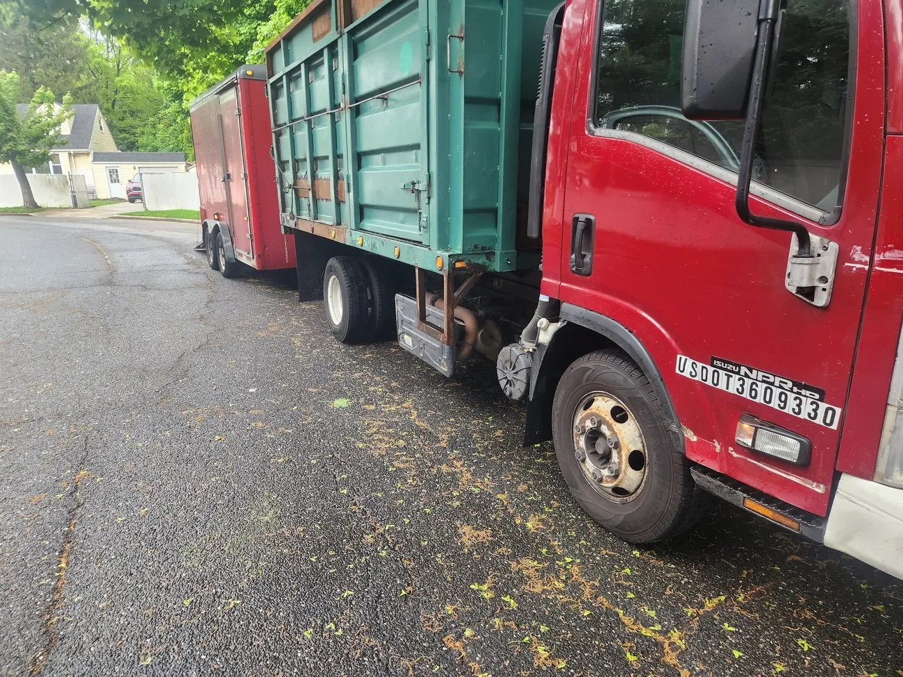 The Green Zone Landscaping truck and equipment trailer, ready for a job on Long Island